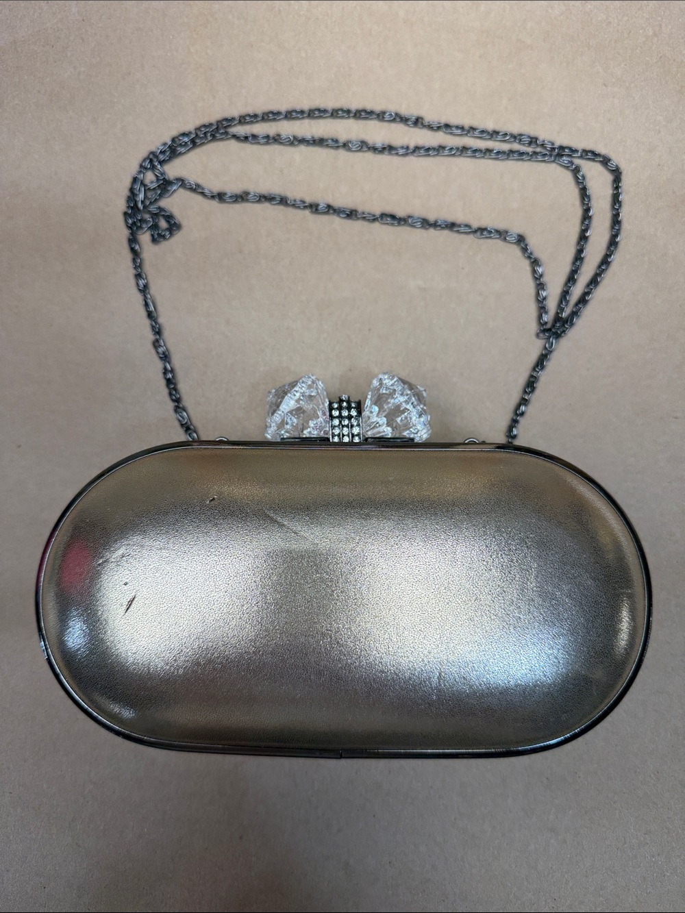 Lulu Townsend Champagne Metallic Oval Clutch with Crystal Bow Accent